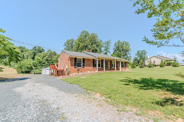 1553 Old Stage Rd, Amherst, VA 24521 - ranch-style house featuring a chimney, brick siding, an outdoor structure, a front lawn, and driveway