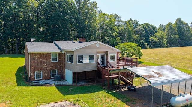 1553 Old Stage Rd, Amherst, VA 24521 - back of property with stairway, a deck, brick siding, a yard, and a chimney