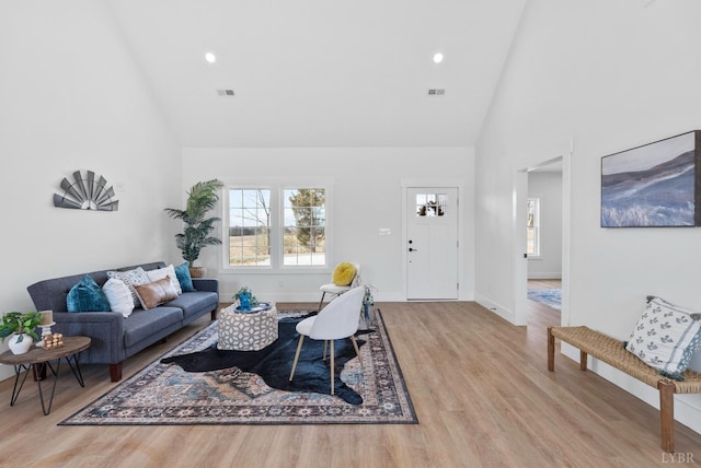 3470 Double Bridges Rd, Spout Spring, VA 24593 - living room featuring high vaulted ceiling, wood finished floors, baseboards, and recessed lighting