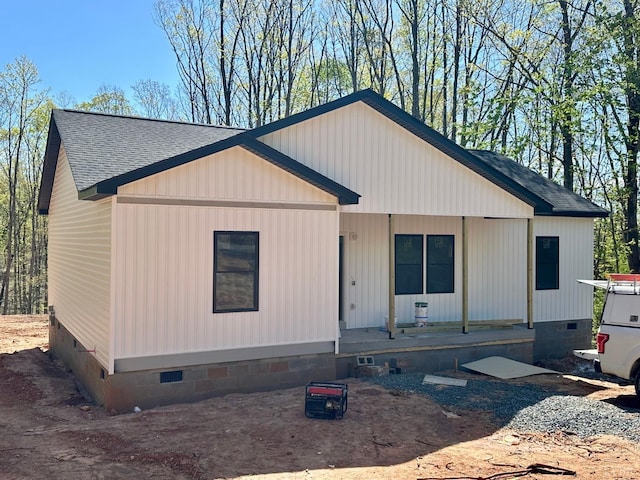 3470 Double Bridges Rd, Spout Spring, VA 24593 - view of front of home featuring crawl space, covered porch, and roof with shingles