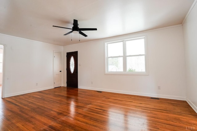 206 Caroline Ave, Brookneal, VA 24528 - unfurnished room featuring crown molding, wood finished floors, baseboards, and a ceiling fan