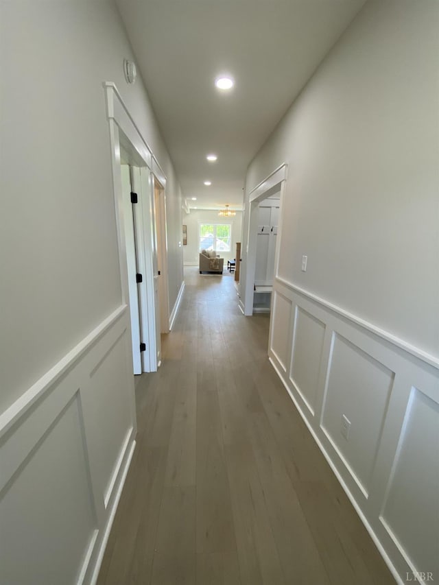 1267 Harborough Dr, Forest, VA 24551 - corridor with recessed lighting, wood finished floors, a decorative wall, and a wainscoted wall