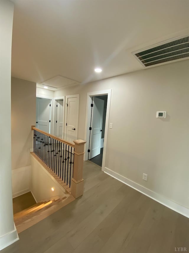 1267 Harborough Dr, Forest, VA 24551 - hallway with an upstairs landing, wood finished floors, recessed lighting, and baseboards