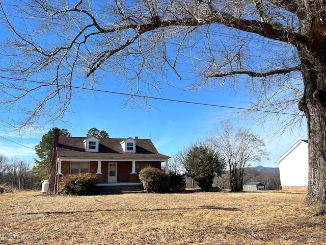 1358 S Coolwell Rd, Madison Heights, VA 24572 - cape cod house featuring brick siding and covered porch