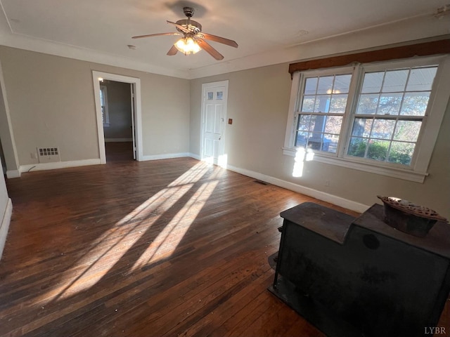 1358 S Coolwell Rd, Madison Heights, VA 24572 - living room with dark wood-style floors, visible vents, baseboards, and a ceiling fan