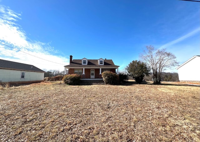 1358 S Coolwell Rd, Madison Heights, VA 24572 - view of front facade featuring a porch and a chimney