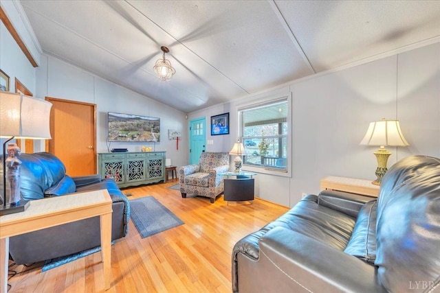3554 Leffel Rd, Roanoke, VA 24018 - living room featuring vaulted ceiling, wood finished floors, and ornamental molding