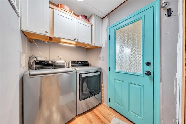 3554 Leffel Rd, Roanoke, VA 24018 - laundry area with cabinet space, independent washer and dryer, and light wood-type flooring