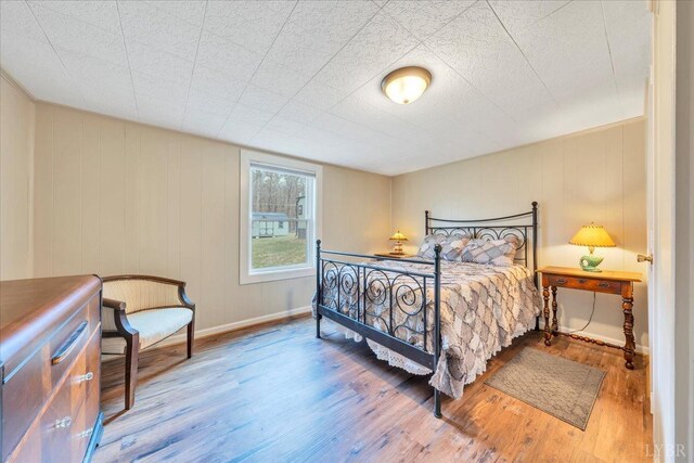 3554 Leffel Rd, Roanoke, VA 24018 - bedroom featuring wood finished floors and baseboards