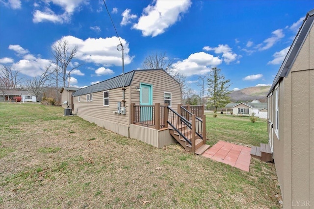 3554 Leffel Rd, Roanoke, VA 24018 - view of side of property with a lawn and central AC