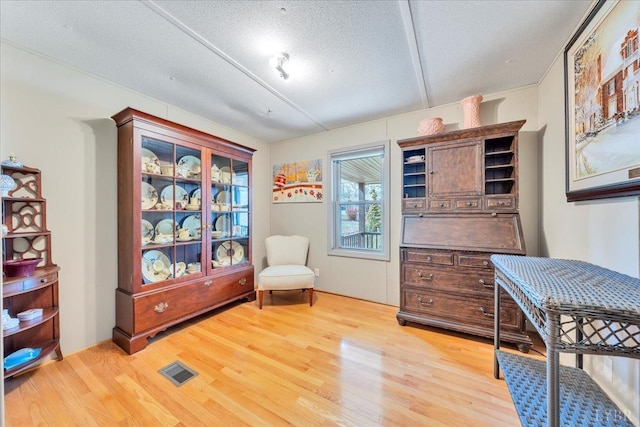 3554 Leffel Rd, Roanoke, VA 24018 - living area with light wood finished floors and a textured ceiling