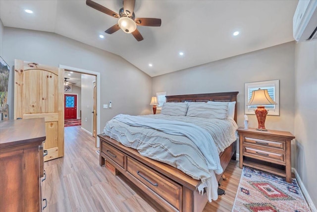 3554 Leffel Rd, Roanoke, VA 24018 - bedroom with lofted ceiling, light wood finished floors, baseboards, an AC wall unit, and recessed lighting