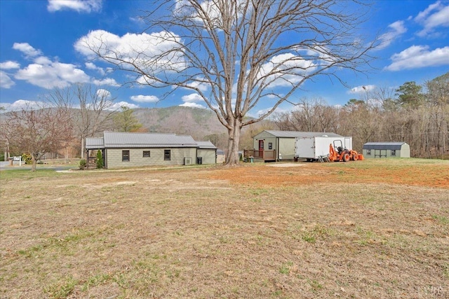3554 Leffel Rd, Roanoke, VA 24018 - view of green lawn with a mountain view