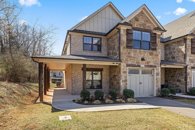 1055 Tori Ct, Forest, VA 24551 - view of front of home featuring board and batten siding, stone siding, and a front yard