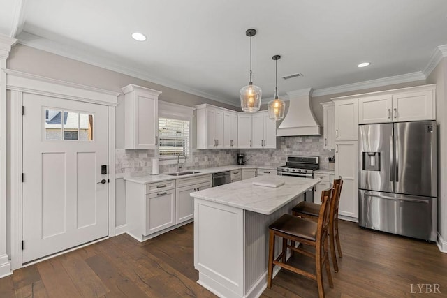 1055 Tori Ct, Forest, VA 24551 - kitchen with appliances with stainless steel finishes, premium range hood, a sink, white cabinetry, and dark wood finished floors