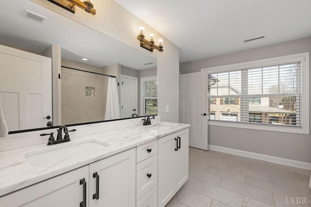1055 Tori Ct, Forest, VA 24551 - bathroom with baseboards, double vanity, and curtained shower