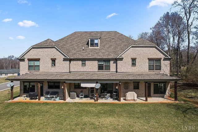 1055 Tori Ct, Forest, VA 24551 - rear view of property with a patio, brick siding, a lawn, and a shingled roof