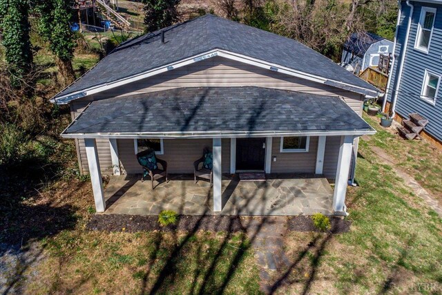 111 Willow St, Lynchburg, VA 24503 - back of property with a yard, a patio area, and roof with shingles