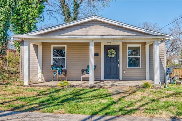 111 Willow St, Lynchburg, VA 24503 - view of front of home with covered porch and a front lawn
