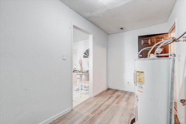 111 Willow St, Lynchburg, VA 24503 - utility room with water heater and visible vents