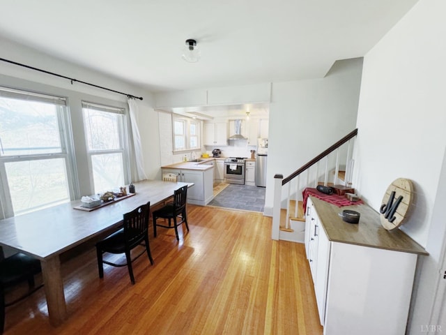 1119 Peaks St, Bedford, VA 24523 - dining space featuring stairway and light wood-style floors