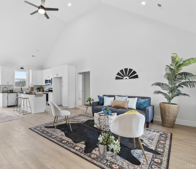 2116 Lime Plant Rd, Appomattox, VA 24522 - living room featuring high vaulted ceiling, a ceiling fan, light wood-style floors, and recessed lighting