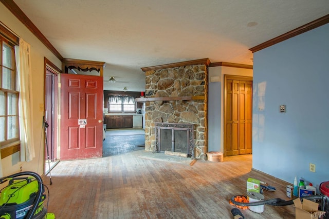 3510 Bear Creek Rd, Rustburg, VA 24588 - unfurnished living room with crown molding, a fireplace, and hardwood / wood-style flooring