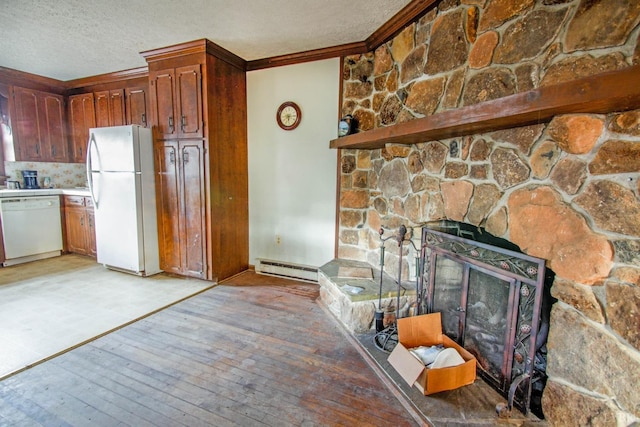 3510 Bear Creek Rd, Rustburg, VA 24588 - kitchen with light wood finished floors, a textured ceiling, a baseboard heating unit, white appliances, and ornamental molding