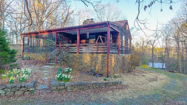 view of outdoor structure with stairway