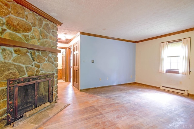 3510 Bear Creek Rd, Rustburg, VA 24588 - unfurnished living room with baseboard heating, hardwood / wood-style flooring, a stone fireplace, a textured ceiling, and crown molding