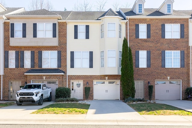 3008 Hill St Unit 306, Lynchburg, VA 24501 - multi unit property with a garage, driveway, and brick siding