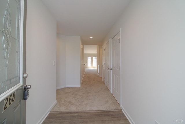 268 Oak Spring Ln, Madison Heights, VA 24572 - corridor with baseboards, recessed lighting, light wood-style floors, and light colored carpet