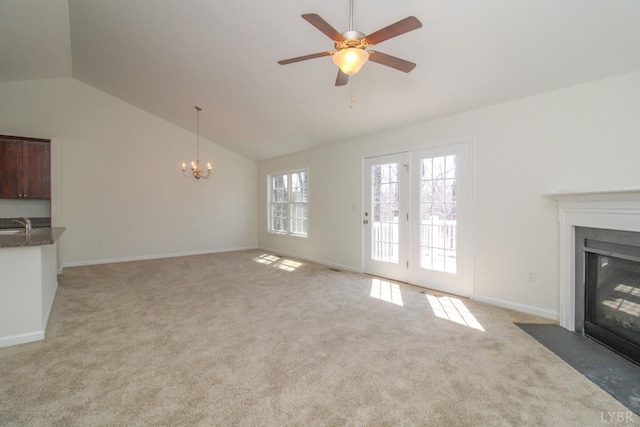268 Oak Spring Ln, Madison Heights, VA 24572 - unfurnished living room with lofted ceiling, light carpet, a chandelier, a ceiling fan, and a fireplace with flush hearth