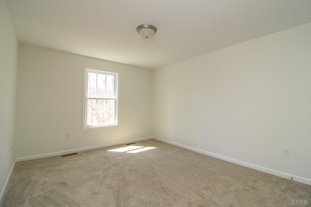 268 Oak Spring Ln, Madison Heights, VA 24572 - carpeted empty room with baseboards