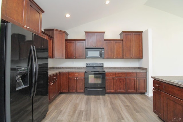 268 Oak Spring Ln, Madison Heights, VA 24572 - kitchen featuring black appliances, lofted ceiling, light wood-type flooring, and recessed lighting