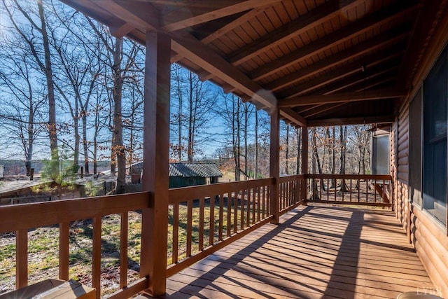 deck with an outdoor structure