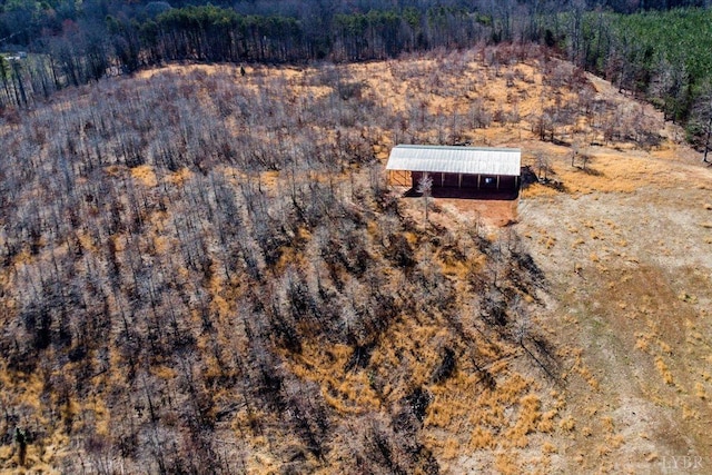 aerial view featuring a forest view