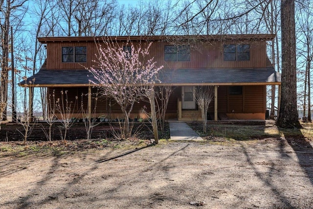 rustic home with covered porch