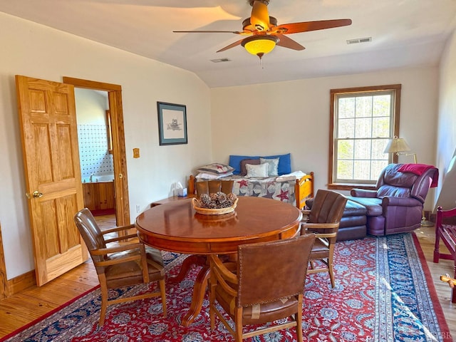 1228 Rosser Mill Rd, Pamplin, VA 23958 - dining room featuring wood finished floors, ceiling fan, and vaulted ceiling