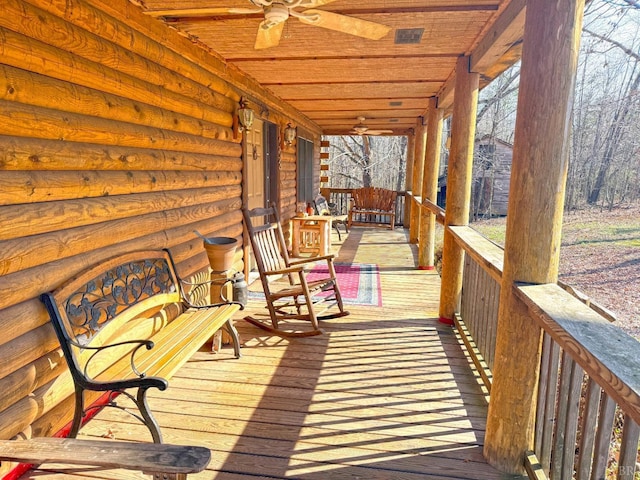 1228 Rosser Mill Rd, Pamplin, VA 23958 - wooden porch with a ceiling fan