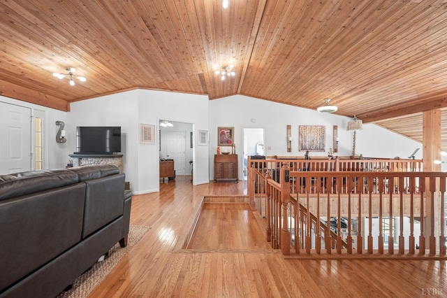 700 Cloudcroft Dr, Monroe, VA 24574 - hallway with vaulted ceiling, an upstairs landing, wood ceiling, and hardwood / wood-style floors