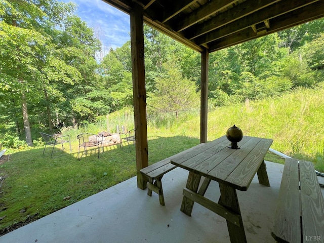 700 Cloudcroft Dr, Monroe, VA 24574 - view of patio featuring a wooded view