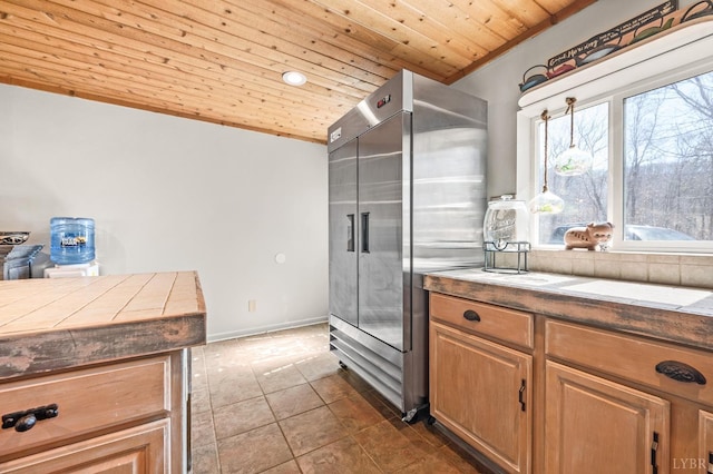700 Cloudcroft Dr, Monroe, VA 24574 - kitchen featuring stainless steel built in fridge, wooden ceiling, baseboards, dark tile patterned flooring, and dark countertops