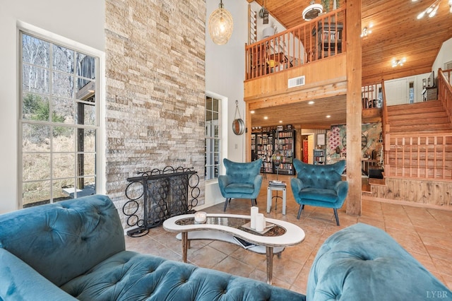 700 Cloudcroft Dr, Monroe, VA 24574 - tiled living area featuring a high ceiling, a fireplace, visible vents, and wood ceiling
