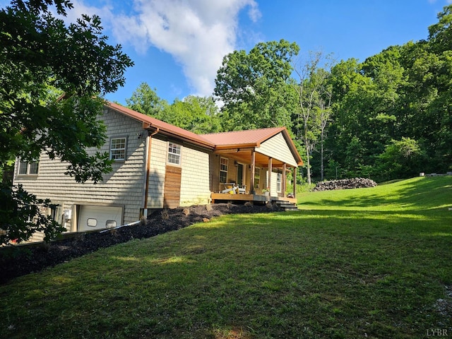 700 Cloudcroft Dr, Monroe, VA 24574 - view of yard featuring covered porch and an attached garage