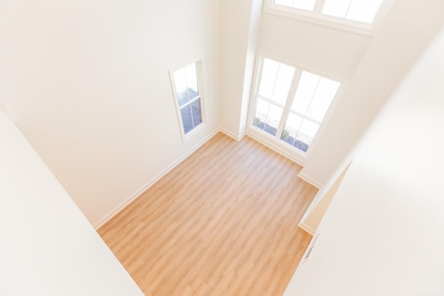 271 Riverside Dr, Lynchburg, VA 24503 - unfurnished living room with light wood finished floors and a towering ceiling