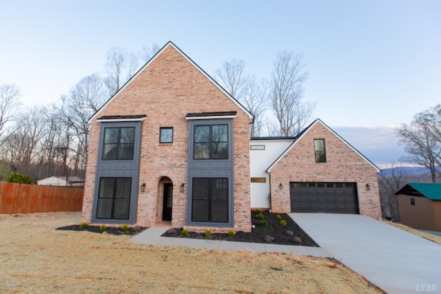271 Riverside Dr, Lynchburg, VA 24503 - view of front of house featuring brick siding, concrete driveway, and a garage