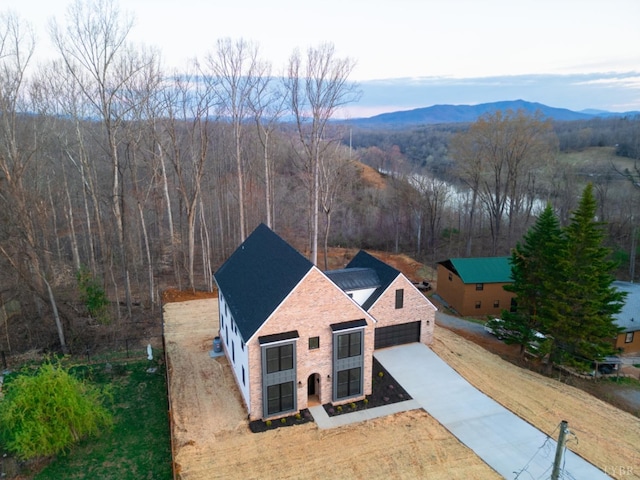 271 Riverside Dr, Lynchburg, VA 24503 - aerial view of property and surrounding area featuring a mountain backdrop and a heavily wooded area