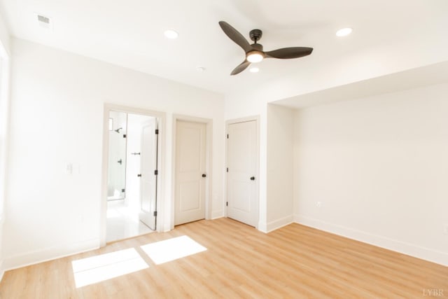 271 Riverside Dr, Lynchburg, VA 24503 - unfurnished bedroom with light wood-style flooring, recessed lighting, connected bathroom, and a ceiling fan