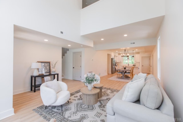 271 Riverside Dr, Lynchburg, VA 24503 - living room featuring light wood-style floors, a chandelier, and recessed lighting